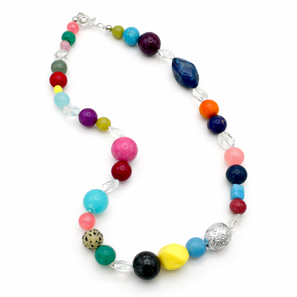 Colorful beaded necklace with a silver clasp on a white background